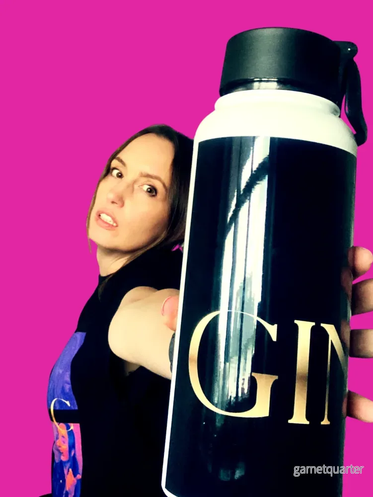 GINAxC - Gold Logo with Silhouette - Stainless steel water bottle with a straw lid